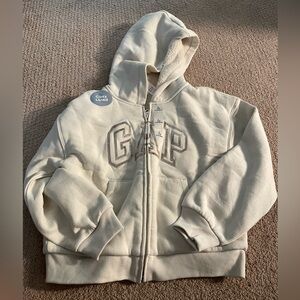 GAP Kids Cream Colored Hoodie with gold/silverish wording, size 10-12